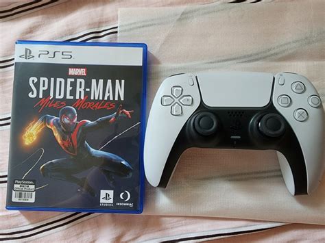 Spider Man Miles Morales And Ps5 Dual Sense Controller Video Gaming Video Game Consoles