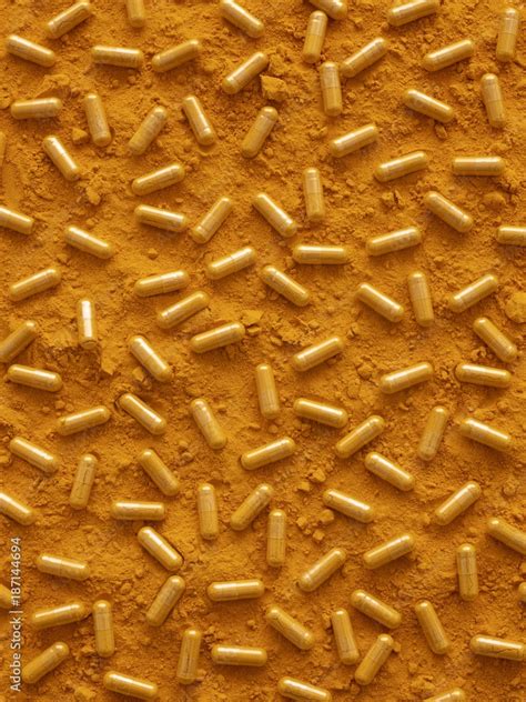 Turmeric capsules and powder Stock Photo | Adobe Stock