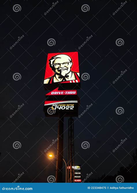 A KFC Colonel Sanders Logo Sign Outside A KFC Restaurant Editorial ...