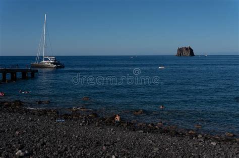 Beautiful Scenery Of A Boat In The Tyrrhenian Sea Near Stromboli Island