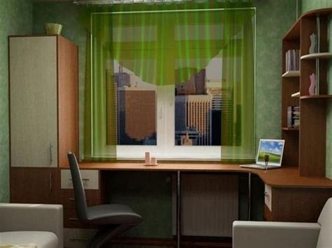 Рабочая зона для школьника у окна фото: место в детской