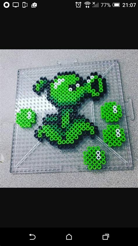 The Pixel Art Is Made With Green Beads