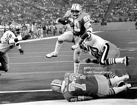 Detroit Lions Running Back Billy Sims Carries The Football And Heads