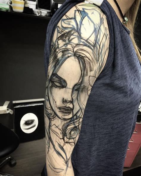 A Woman S Arm With A Tattoo On It And An Image Of A Woman