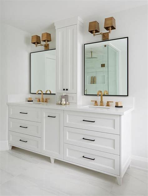 Brass Sconce With Black Vanity Mirror Transitional Bathroom