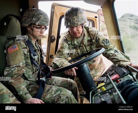 Arizona Army National Guard Spc Anna K Xenitelis Receives Instruction