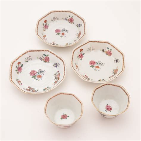 A Group Of Seven Famille Rose Cups With Saucers Two Bowls And Two