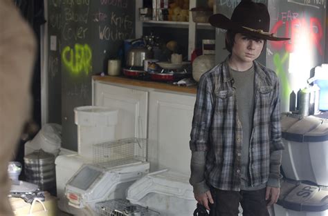 ‘The Walking Dead’ “Clear” Photo Sneak Peek: Who’s Shooting At Rick?