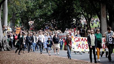 Thousands take to Melbourne streets to protest against Abbott ...