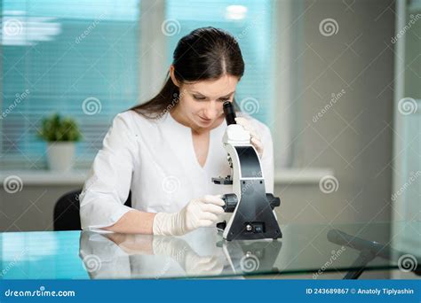 Female Medical Worker Conducting Laboratory Research With Microscope Stock Image Image Of