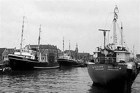 Black And White Photograph Of Boats In The Water