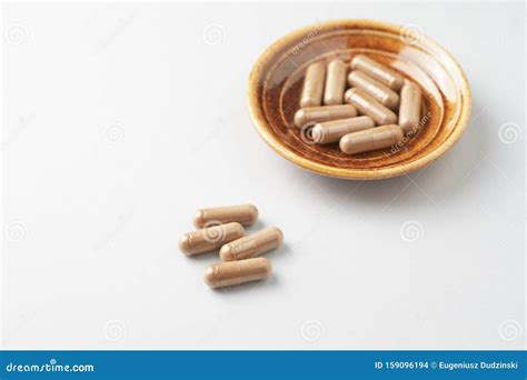 Reishi Mushroom Capsules. Concept for a Healthy Dietary Supplementation Stock Photo - Image of ...