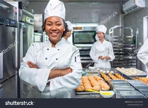 Smiling African Female Bakers Looking Camerachefs Stock Photo ...