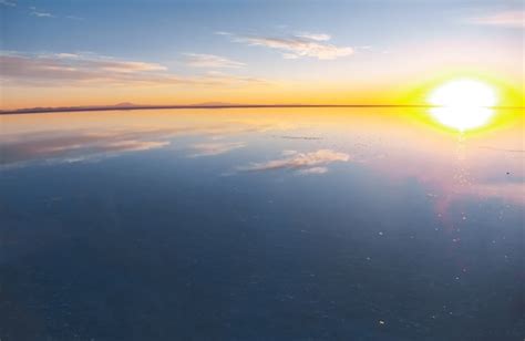 Premium Photo Sunrise On Salar De Uyuni In Bolivia Covered With Water