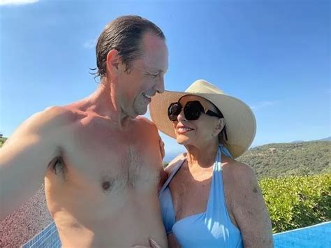 Joan Collins Wows Fans In Blue Bikini At While On Holiday With Toyboy Husband Aged