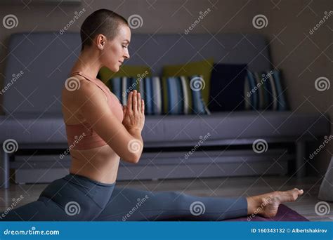 Beautiful Sporty Woman Doing Stretching Exercise In Yoga Split Stock