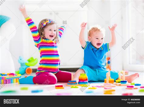 Children Playing With Wooden Toys Stock Photo And Stock Images Bigstock