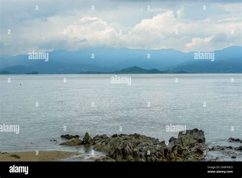 The Photo Captures A Breathtaking View Of A Serene Beach With Crystal