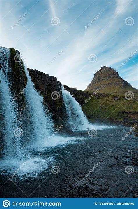 Famous Icelandic Waterfalls with Looming Kirkjufell Arrowhead Mountain in Background Stock Photo ...