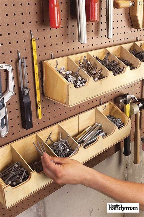 A Man Is Working In His Garage With Tools On The Pegboard And Hanging