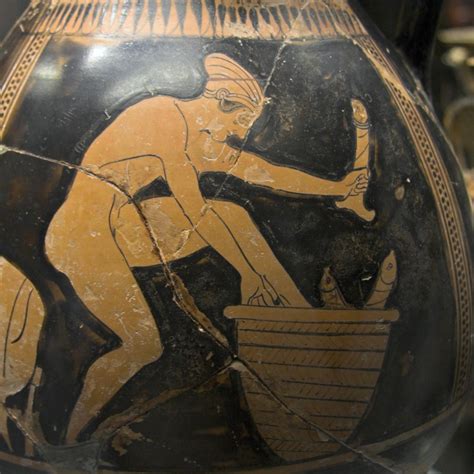 An Attic Red Figure Amphora Depicting A Naked Woman In The Vicinity Of