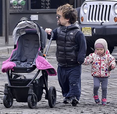 Game Of Thrones Peter Dinklage Takes Toddler Daughter For Stroll