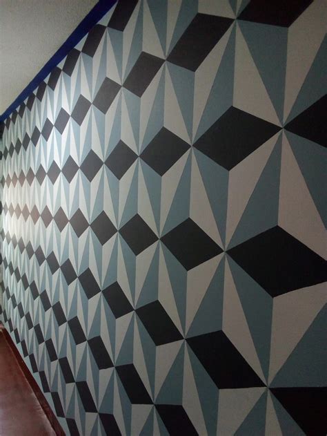 diseño geometrico en pared en 3d en colores suaves vinilos acrilicos