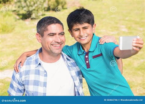 Father And Son In The Countryside Taking Selfie Stock Photo Image Of Escapism Mature