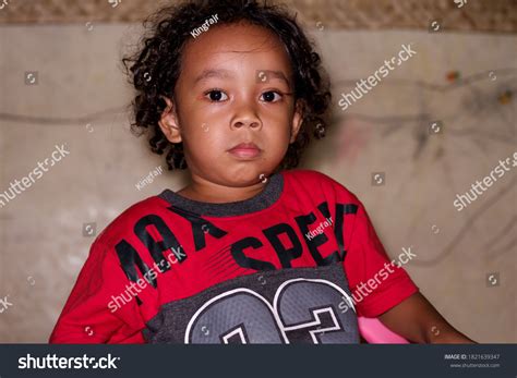 Portrait Curly Haired Asian Boy Wearing Stock Photo 1821639347