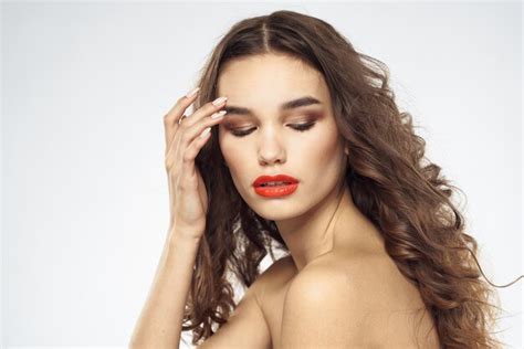 Premium Photo Beautiful Brunette With Naked Shoulders And Bright Makeup Isolated