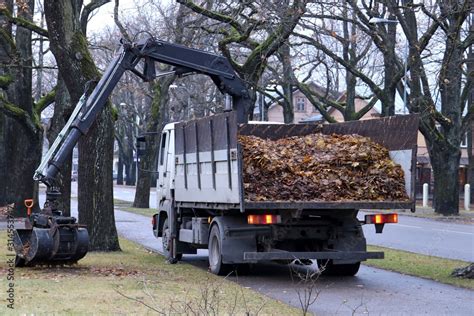 Dump Truck With Crane Clamshell Telescopic Arm Stock Photo Adobe Stock