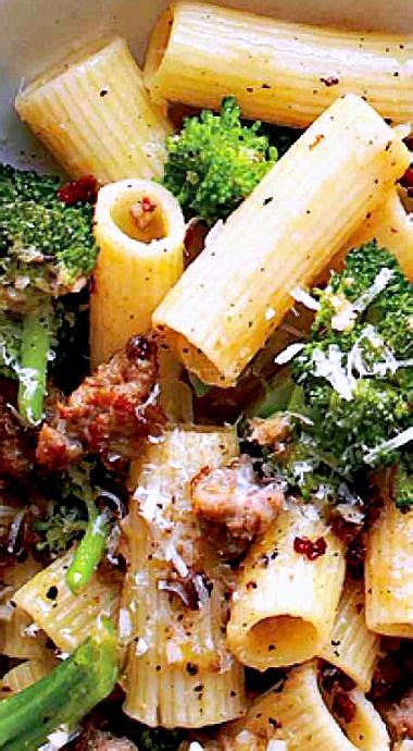 A Bowl Filled With Pasta Broccoli And Meat