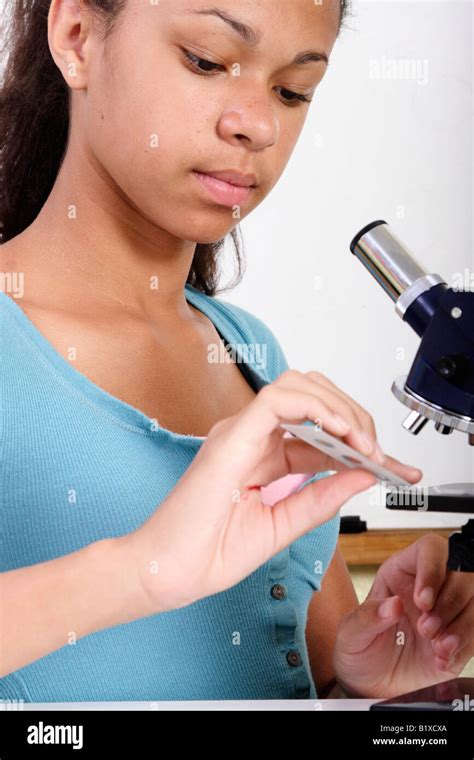 Stock Photograph Of A Student Using A Microscope Stock Photo Alamy