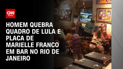 Homem Quebra Quadro De Lula E Placa De Marielle Franco Em Bar No Rio De