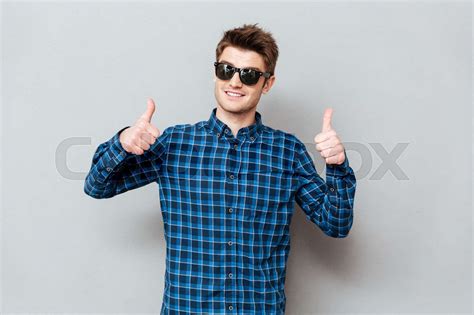 Happy Man Wearing Sunglasses Showing Thumbs Up Stock Image Colourbox