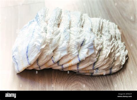 Scattered On The Floor Are A Bunch Of Clean Diapers Personal Hygiene