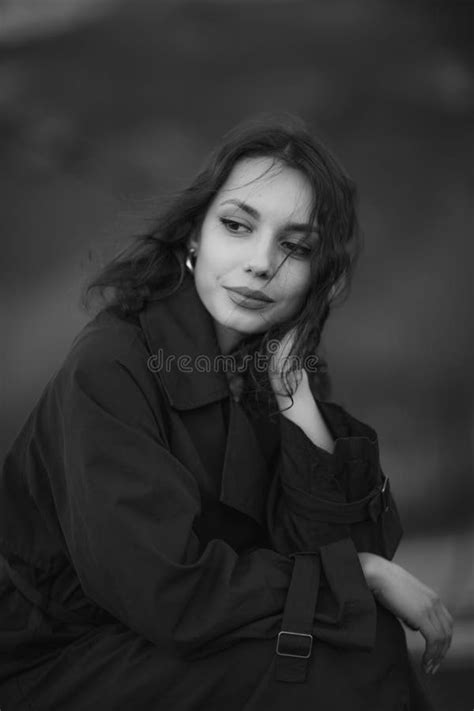 Beautiful Brunette European Girl In Blue Trench Coat At Nature Stock Photo Image Of Long