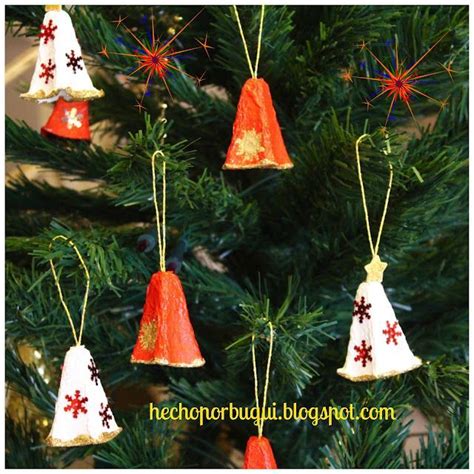 Christmas Ornaments Hanging From The Branches Of A Tree