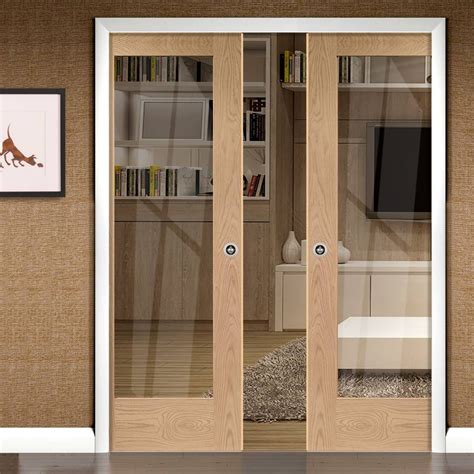 Pattern 10 Oak Double Evokit Pocket Doors Clear Glass Prefinished