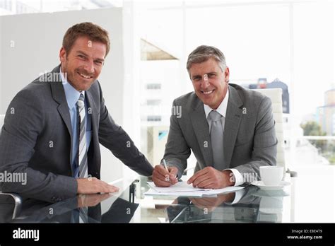 Two Businessmen Negotiating Stock Photo Alamy