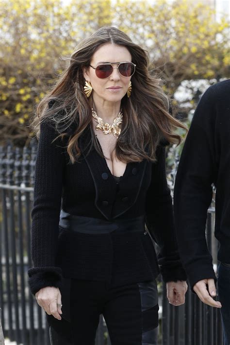 ELIZABETH HURLEY and NATHALIE COX on the Set of Christmas in the