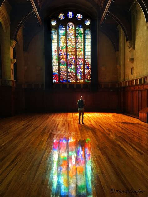 Arts Centre Christchurch New Zealand A Man Takes In The Newly Reinstalled Stained Glass