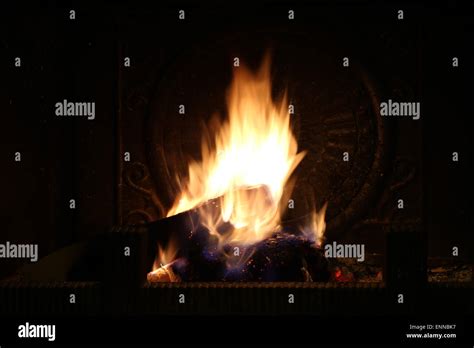 Burning Firewood In The Fireplace Stock Photo Alamy