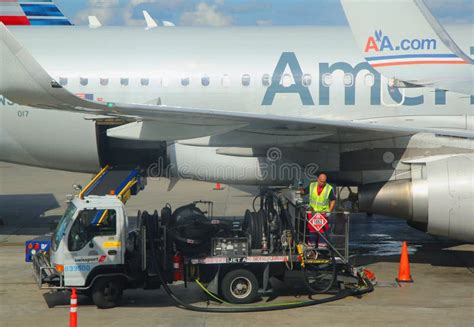 American Airlines Worker Refueling Plane at Miami International Airport ...