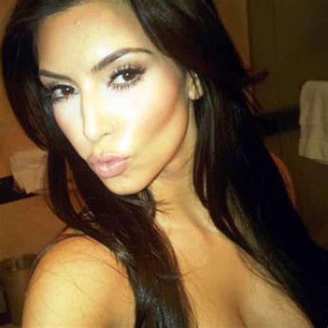 Kim Kardashian Showing Big Cleavage In Bikini By The Pool And Her Big Tits Porn Pictures XXX