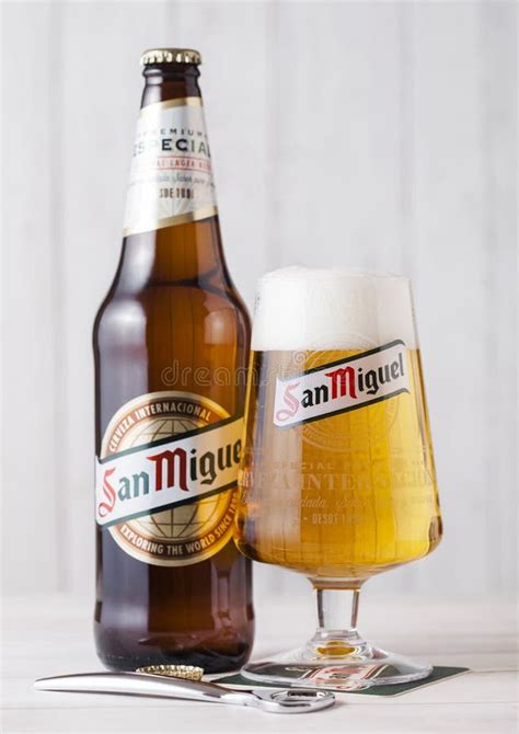 London Uk April 27 2018 Glass Bottle Of San Miguel Lager Beer On Wooden Background With