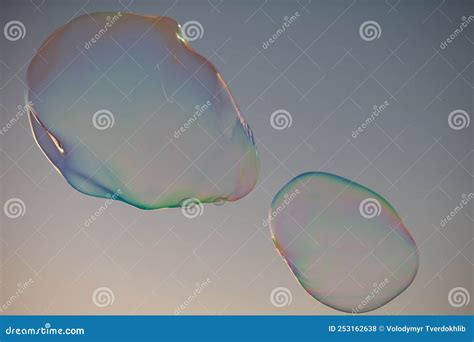 Big Bubble Flying Over Blue Sky Huge Colorful Soap Bubbles Fly Over