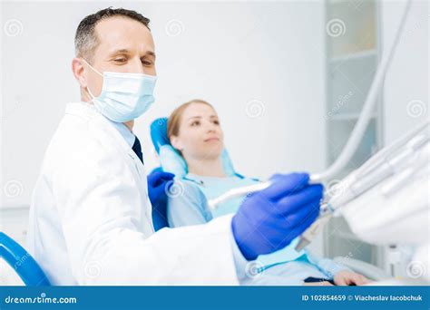 Smart Experienced Dentist Taking His Tools Stock Image Image Of