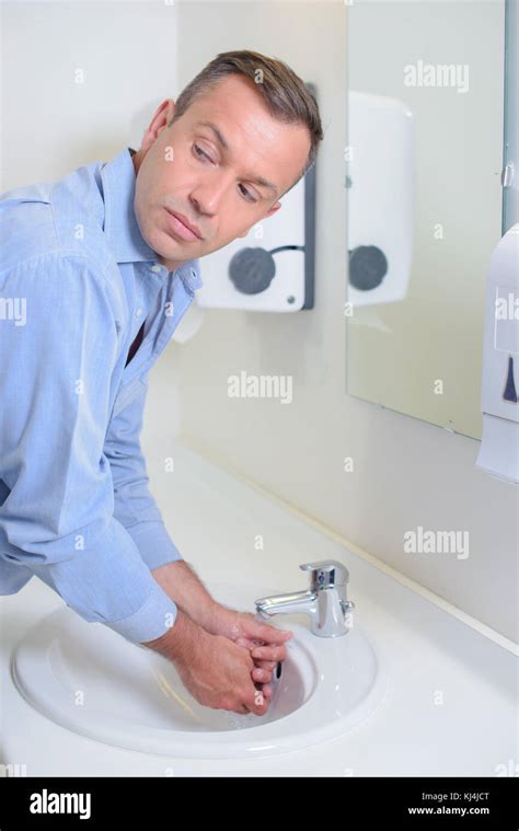 Man Washing Hands Stock Photo Alamy