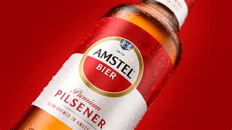 Brand New: New Logo and Packaging for Amstel by Elmwood